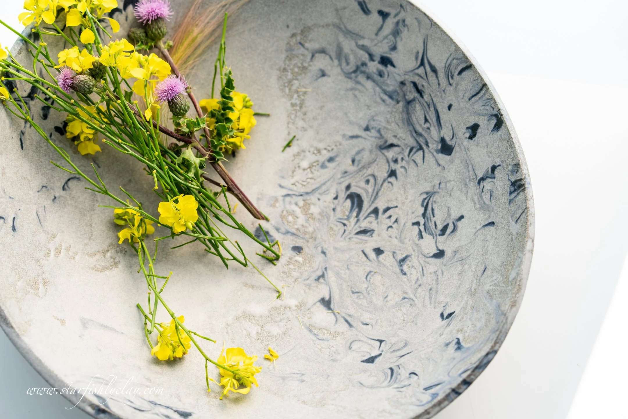 This bowl has a beautiful, organic marbled texture with a soft, earthy glaze. Handmade in YYC. Calgary. Alberta. Made in Canada. Handmade Ceramics. Locally made Pottery.