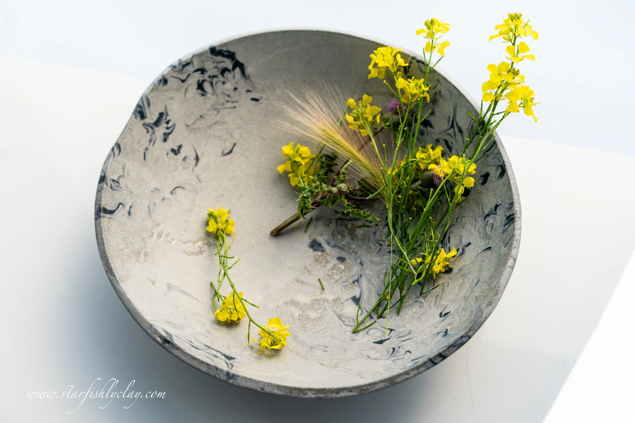 This bowl has a beautiful, organic marbled texture with a soft, earthy glaze. Handmade in YYC. Calgary. Alberta. Made in Canada. Handmade Ceramics. Locally made Pottery.
