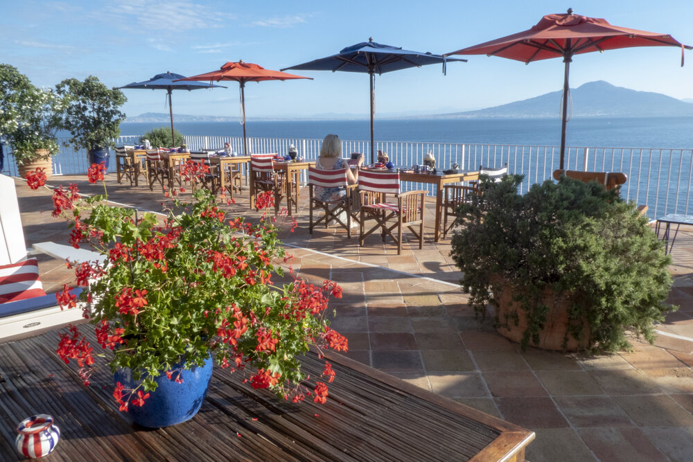  Take in breathtaking views of Mount Vesuvius from one of the local hotel terraces - Boutique Hotel Helios is highly recommended for its panoramic views 