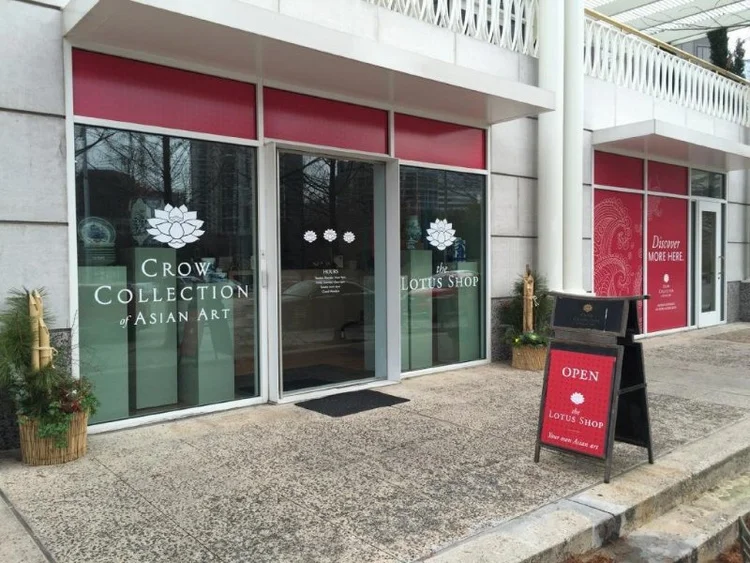 Temporary branding for the Collection's gift shop and gallery spaces under construction.