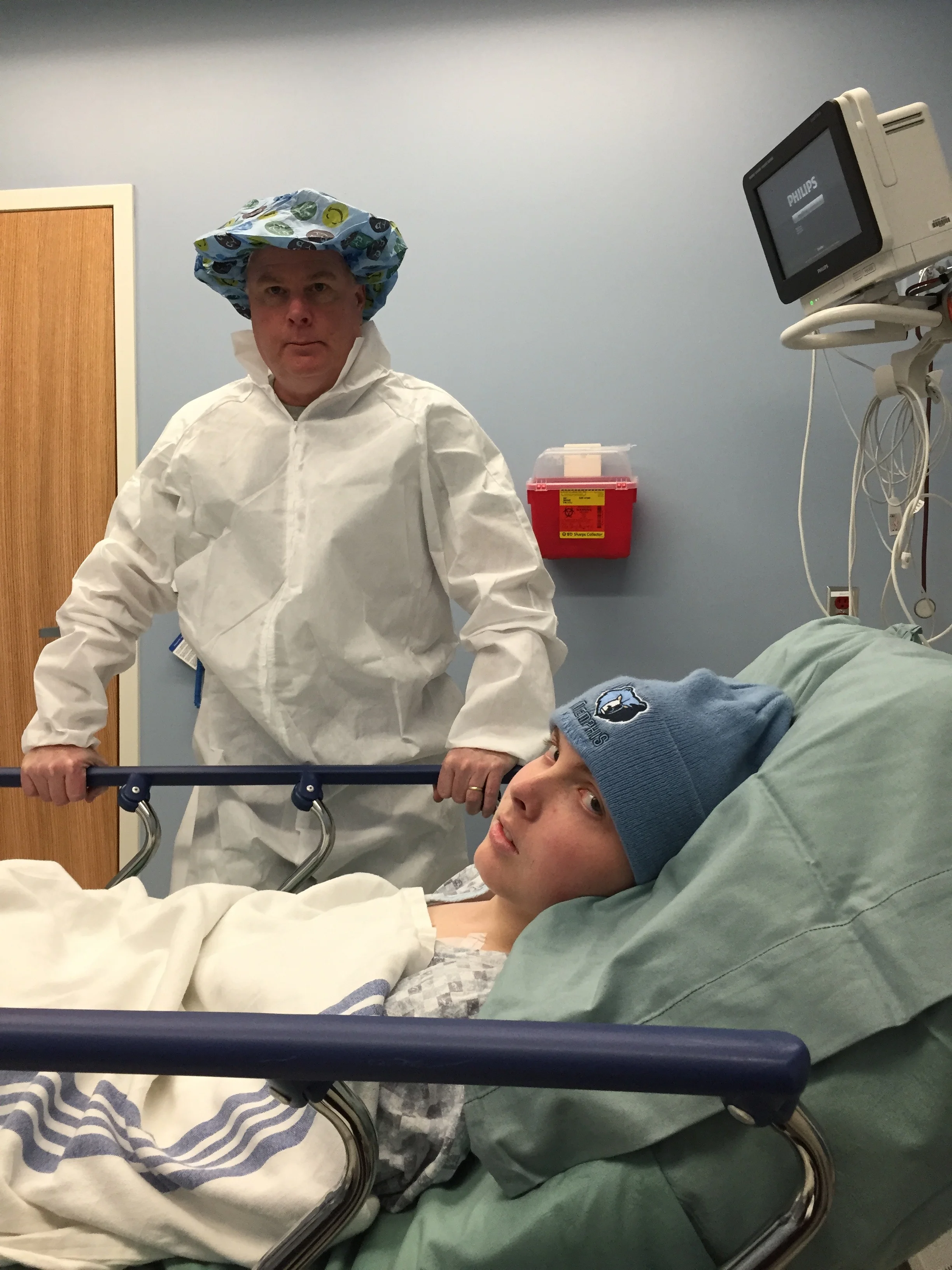 Adam and his dad before Adam’s surgery.