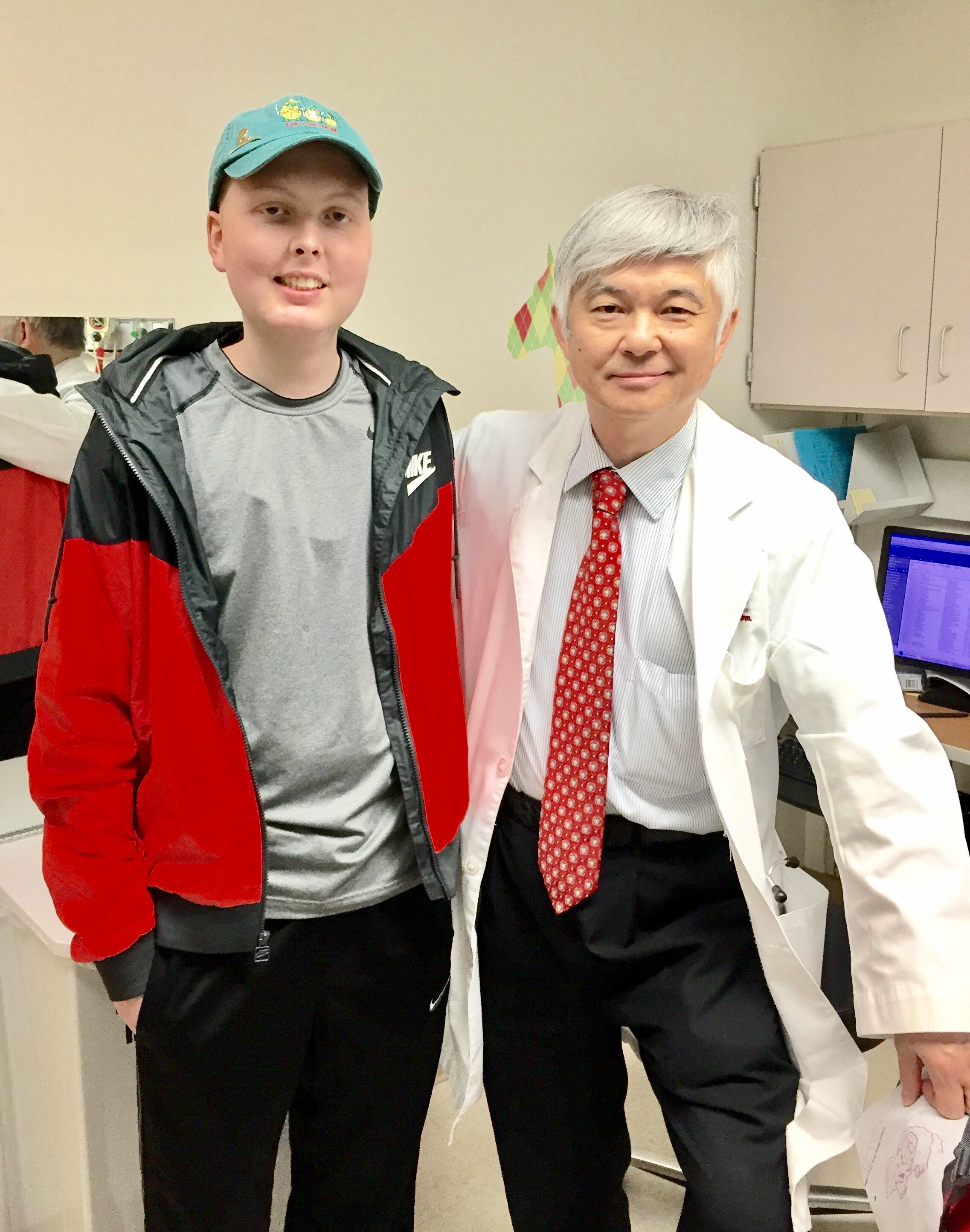 Adam with Dr. Pui at St. Jude.