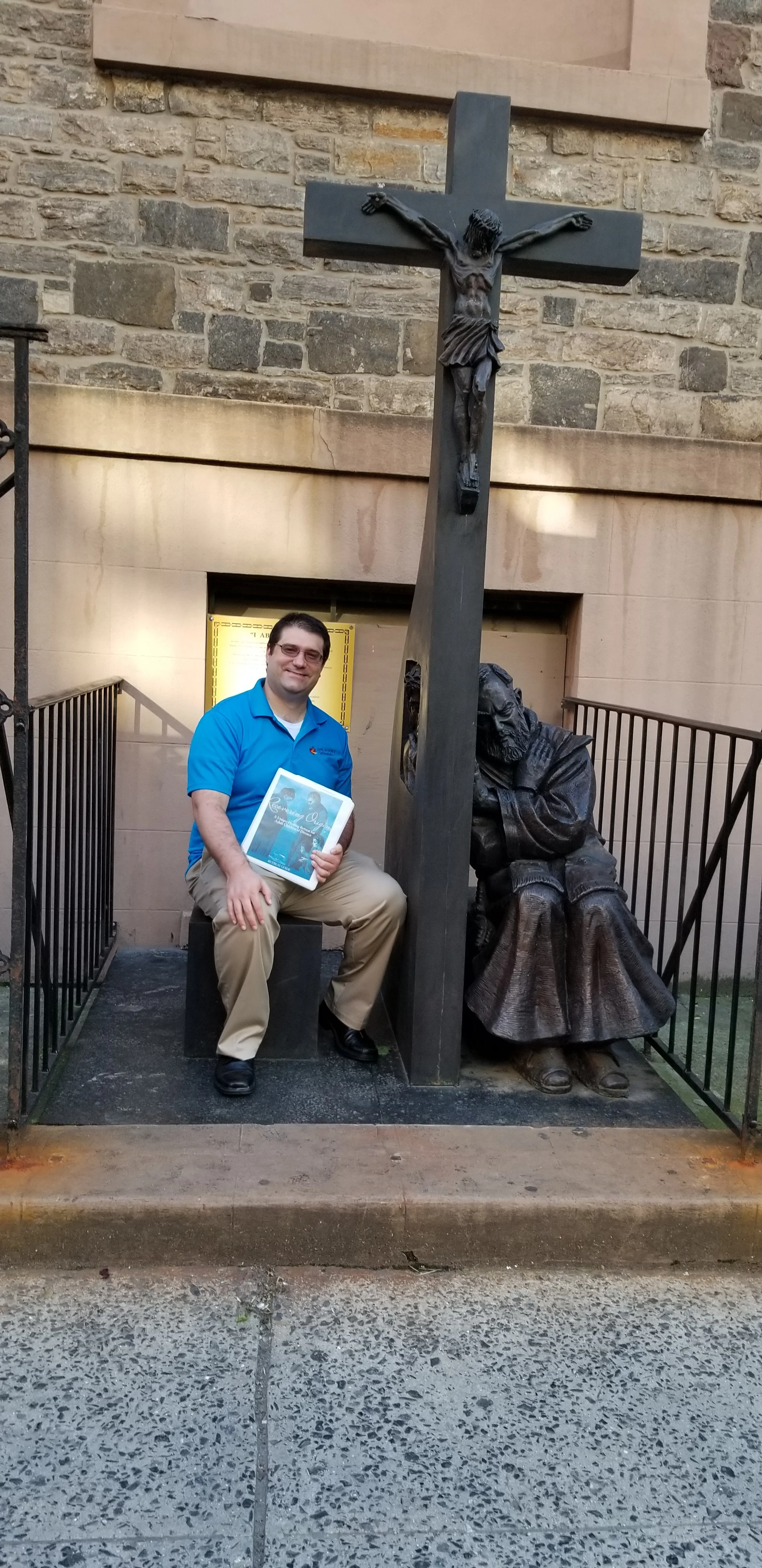 Here I’m sitting in “confession” with my Recovering Origins Binder and Saint Padre Pio - notice how the confessional screen is the Crucifix.