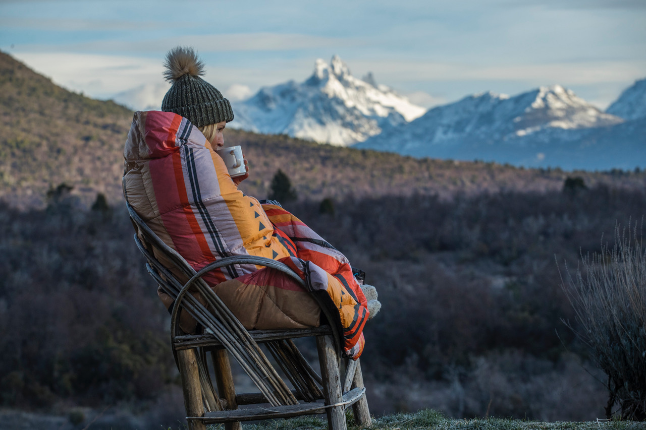 Amie Engerbretson wrapped in a Rumpl blanket in Patagonia