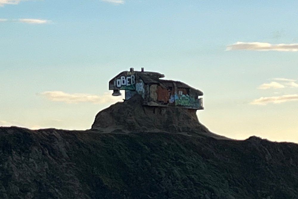 Random building on a cliff