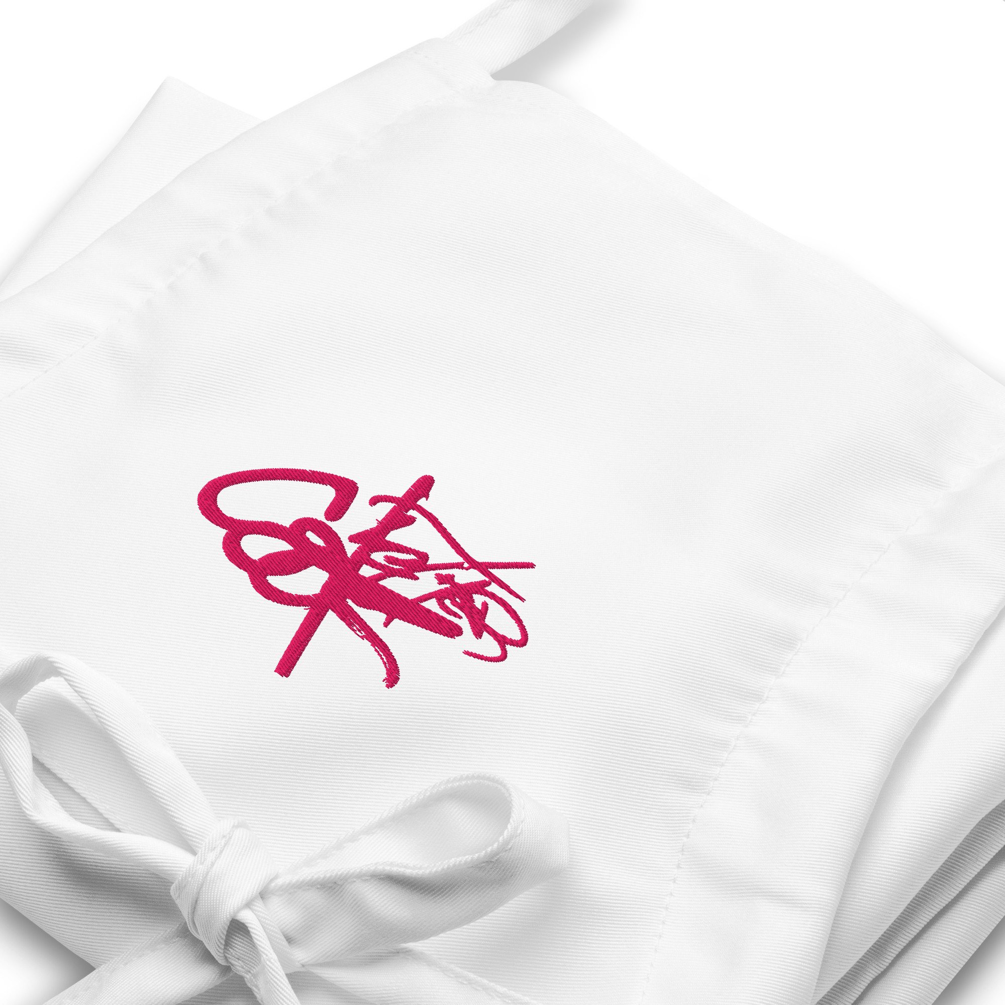 embroidered-apron-white-zoomed-in-68d6081e4cebc.jpg