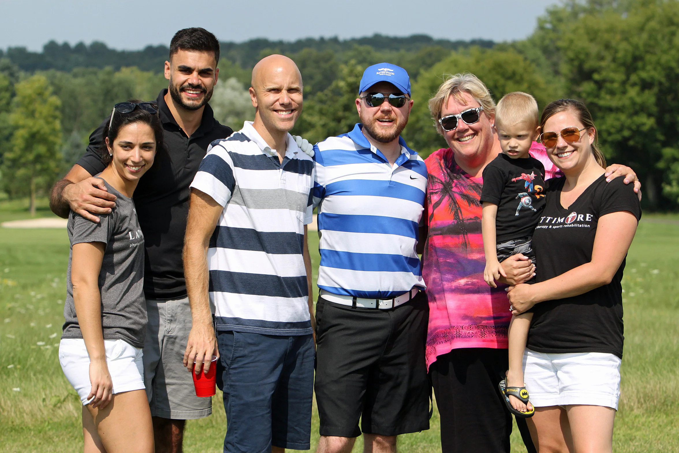 Lattimore team having fun at our golf event!