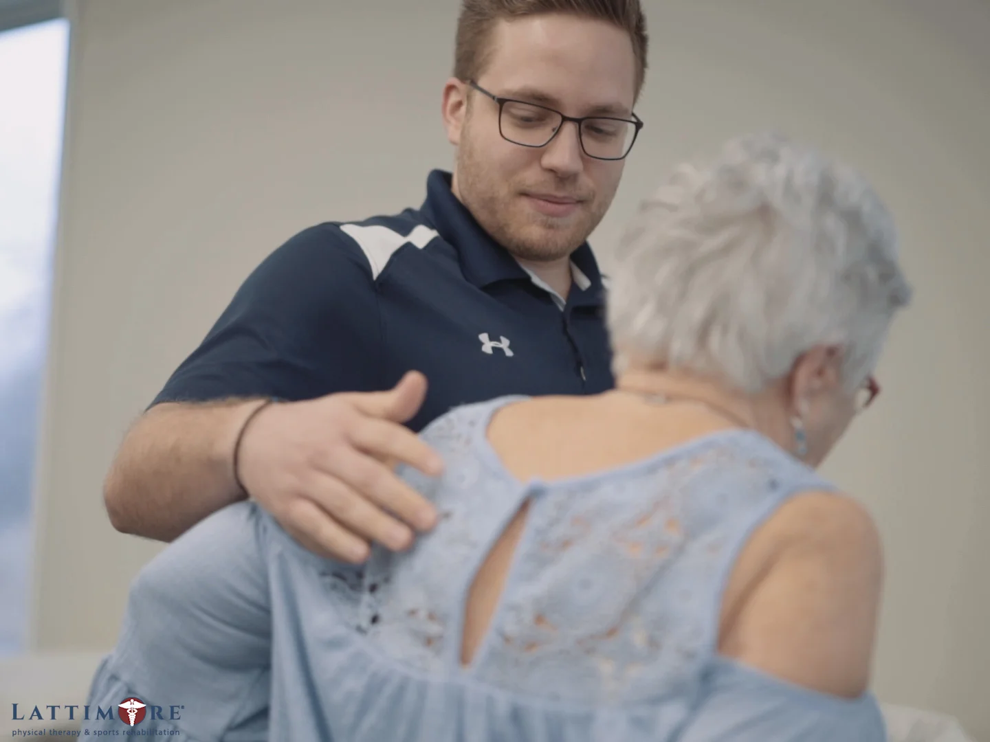 Lattimore North Greece Physical Therapist Niko Working With Patient