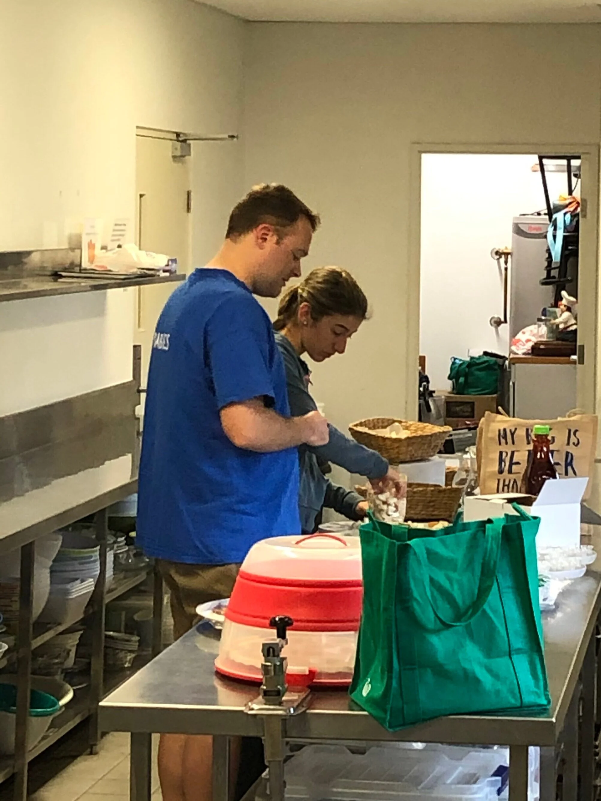 Ian &amp; Emma Girvan, preparing communion, before going to serve on welcome and then SG Kids ministry. WOW, thank you guys.