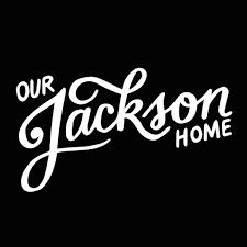 "Our Jackson Home" logo in cursive white text on a black background.