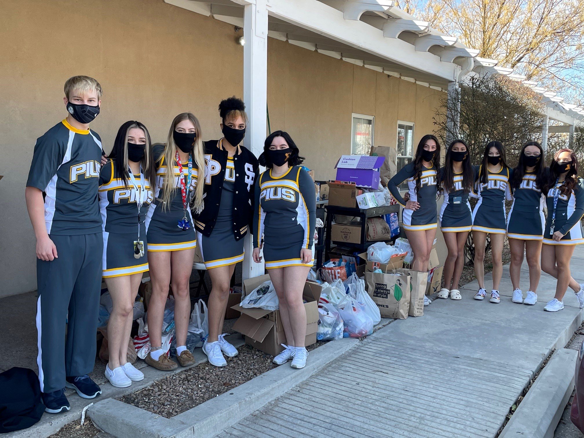 st. pius cheerleaders donation - group 1.jpg