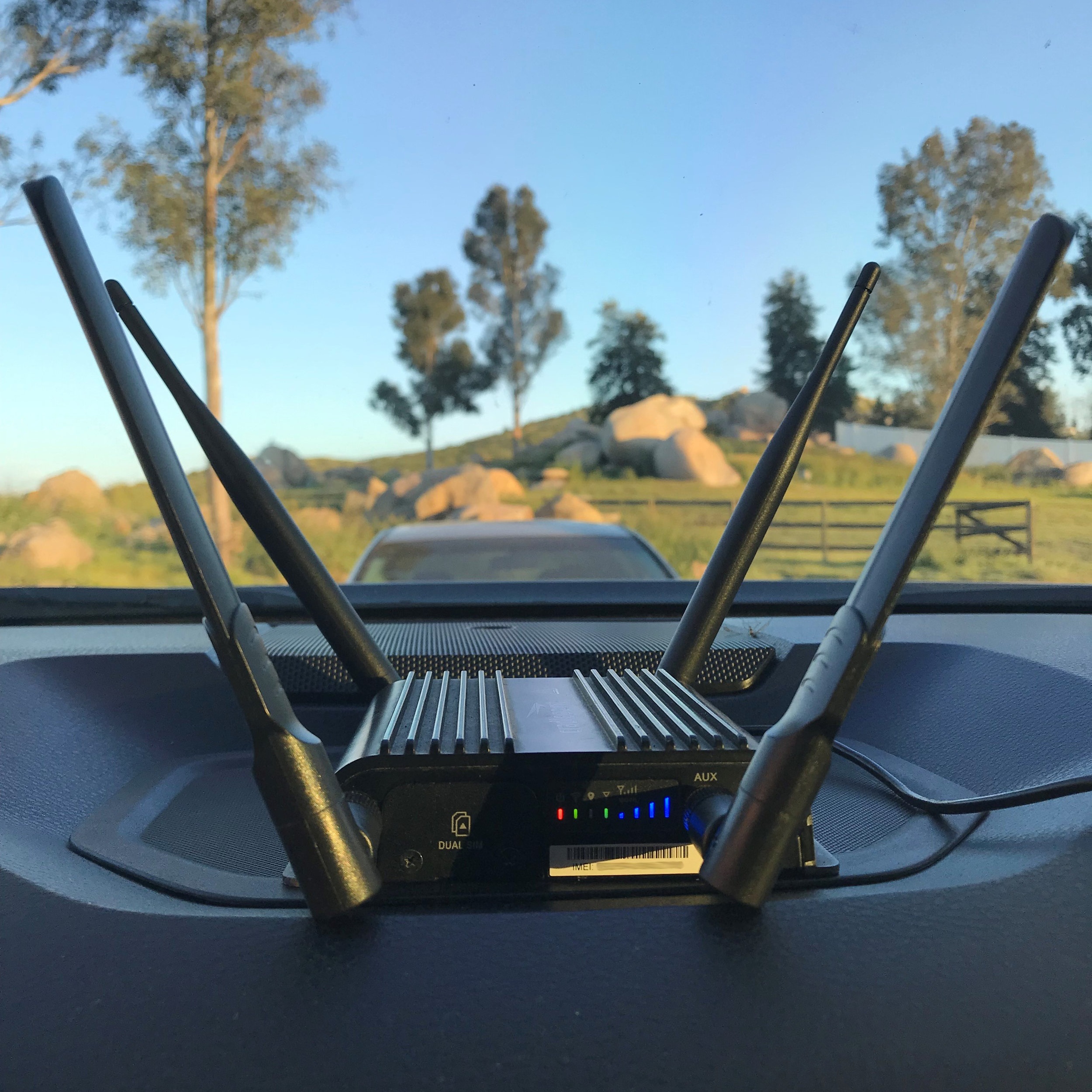 cell modem 900 vehicle setup with stick antennas.jpg