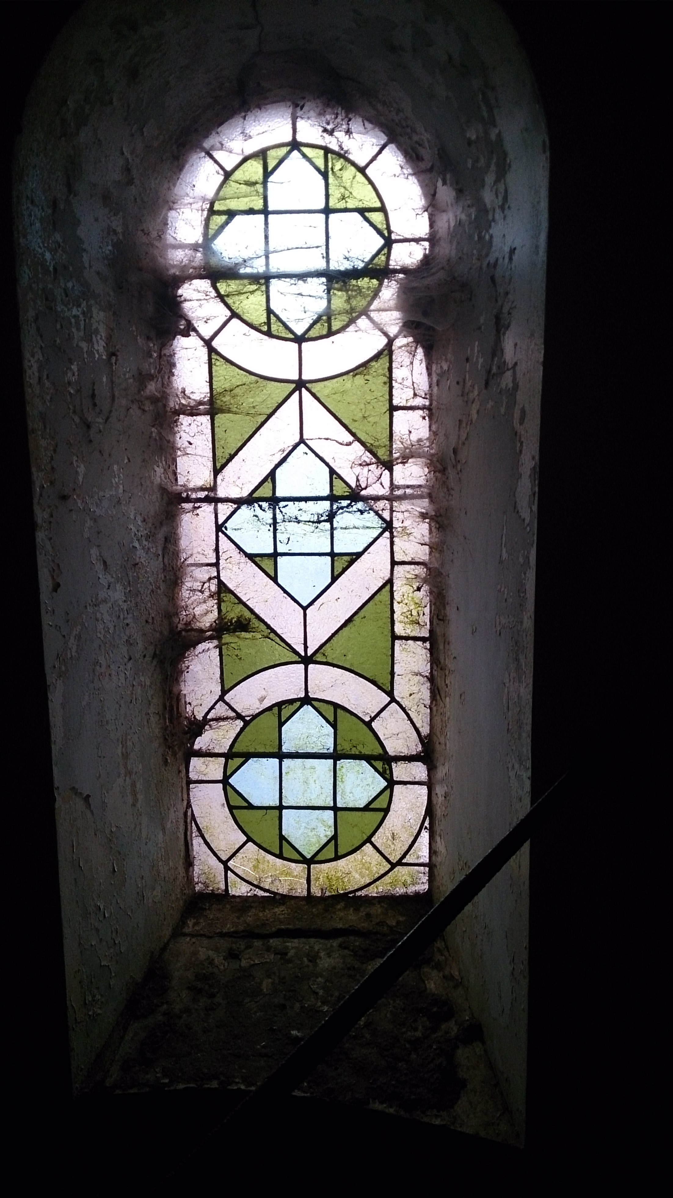 stained glass in gallery.JPG