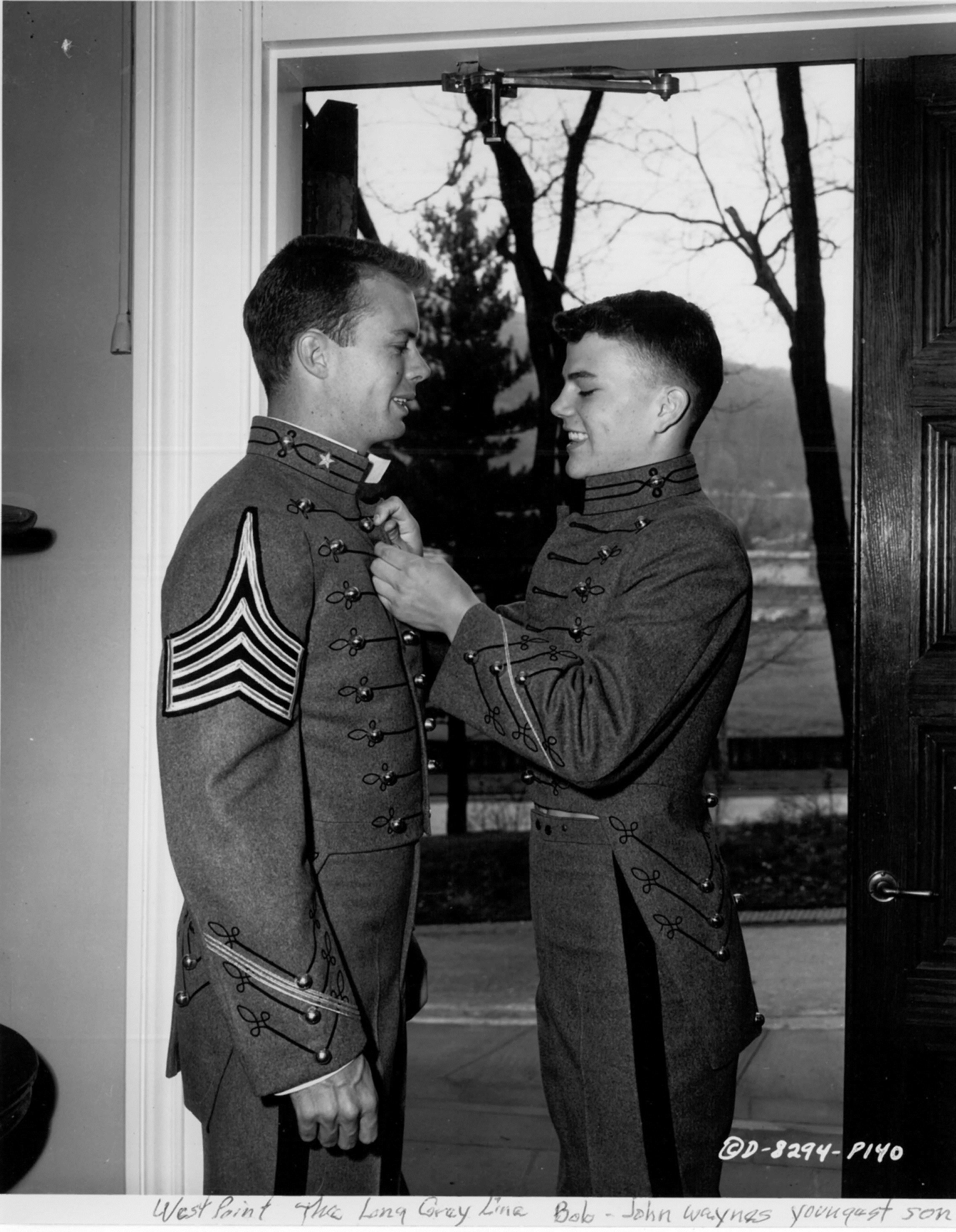  Publicity Photos, Columbia Pictures, West Point, N.Y. Bob and Patrick Wayne, son of John Wayne. John Ford and John Wayne had a long productive relationship as actor and director in classic westerns as well as films like  The Quiet Man   (1952), co-s