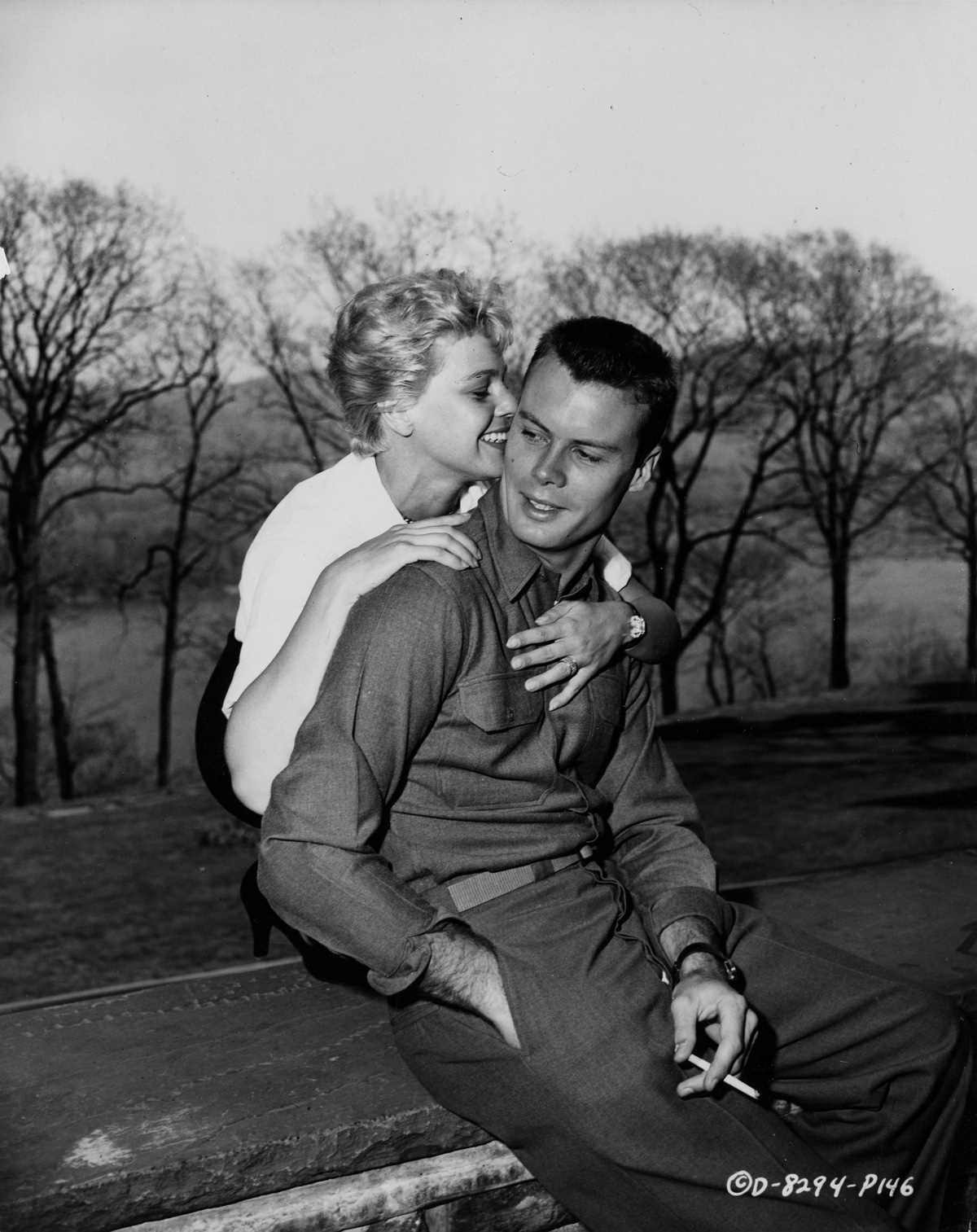  Publicity Photo, Columbia Pictures, West Point, 1954 “A SECRET - Betsey Palmer whispers something to Bob Francis between scenes on location at West Point….” 