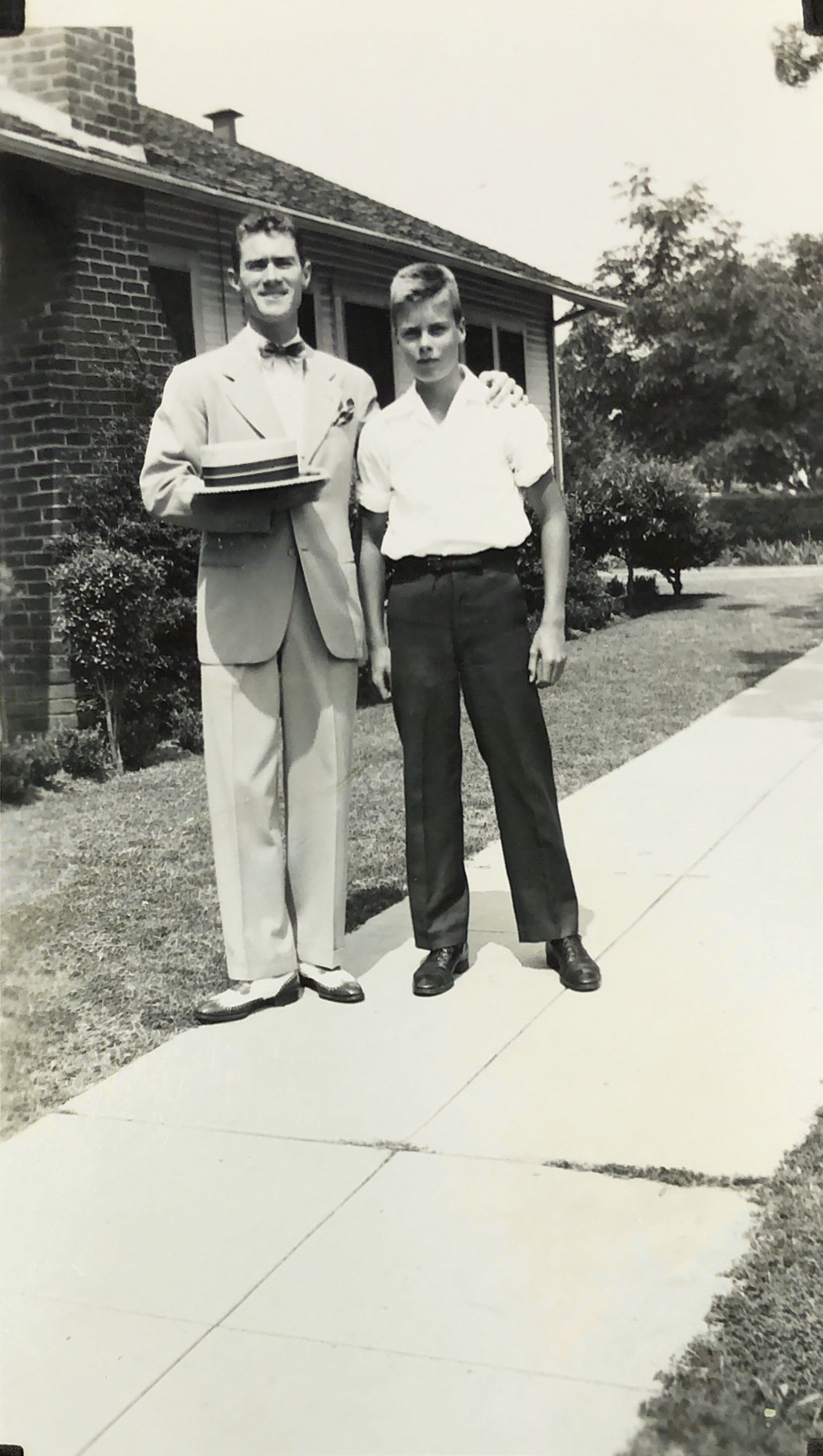  Bill Francis and Bob Francis, c. 1943  Bob appears to be about 12 or 13. Perhaps taken around the time of Bill’s marriage to Betty Jeans Gross. Location: The Del Mar Blvd. side of the house at 212 S. Grand Oaks Ave. in Pasadena. The Robins Family Co
