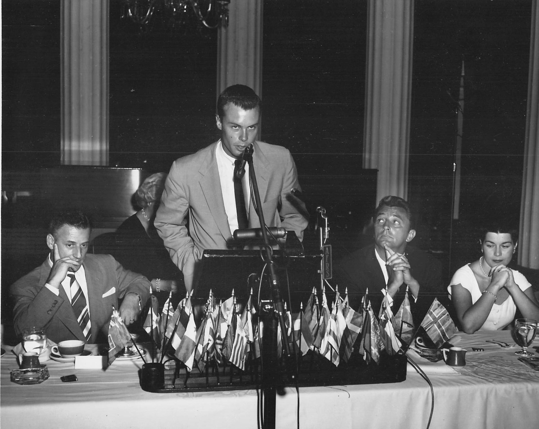  Early Fall 1954  Columbia began to use Bob in various “big moments” at the studio and in Hollywood. This appears to be a luncheon event welcoming foreign dignitaries, perhaps foreign press people, to the studio. Stanley Kramer sits to Bob’s right, a