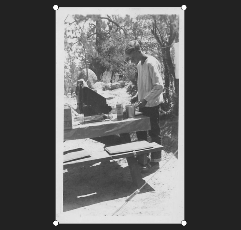  Mid-1940s  Bob preparing food perhaps during a camping trip or family event. Bob’s hair is longer again. He looks to be about 15 or 16, when he was finishing high school. The Robins Family Collection. 