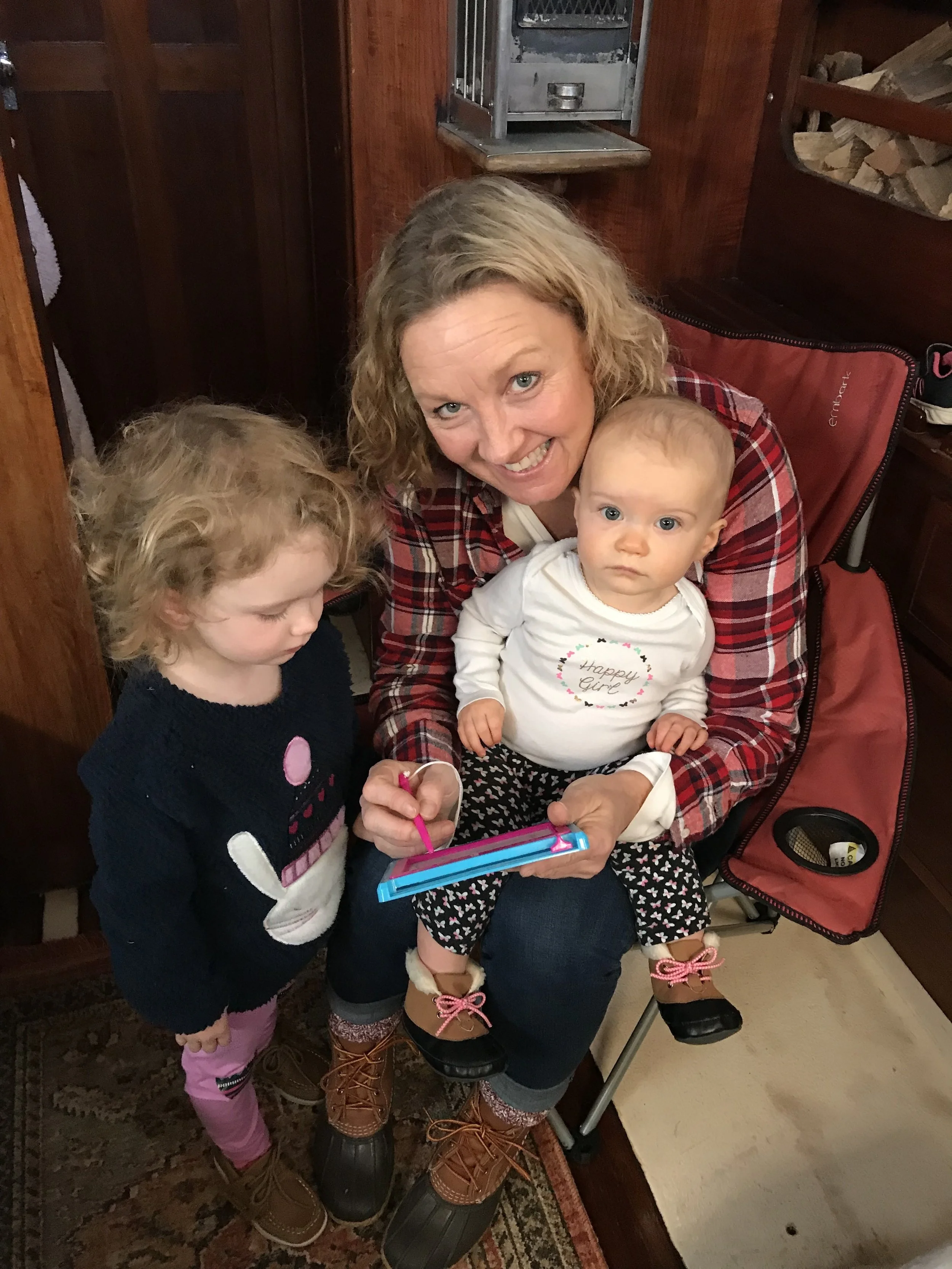 Boopa and the girls on Christmas Eve, aboard SV Alive, while docked in Myrtle Beach, SC.