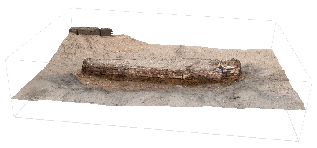 Fig.1. Scanning the painted coffin discovered this season outside the east corner gateway of the Shunet el-Zebib. Photo: Blair Simmons / North Abydos Expedition © 2019