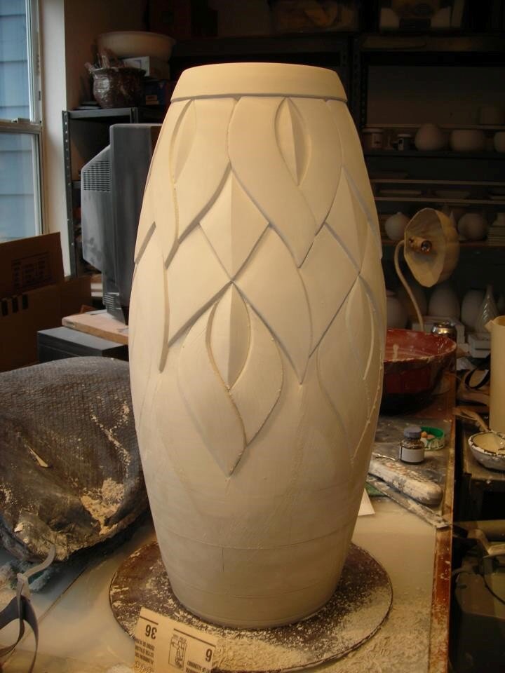 Day 2 - Carving progresses Cylindrical Round Full Lotus Vase by Lynne Meade was commissioned for the renovation of the historic Art Deco Raleigh Hotel in Miami Beach (South Beach), FL, originally designed and built in the early 1940s by architect L. Murray Dixon , a principal architect of Deco South Beach, and whose “iconic pool” was featured on the cover of Life magazine and in films.