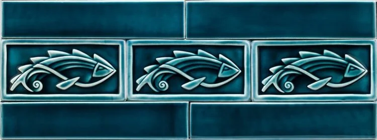 Row of carved fish and liner tiles - blue celadon