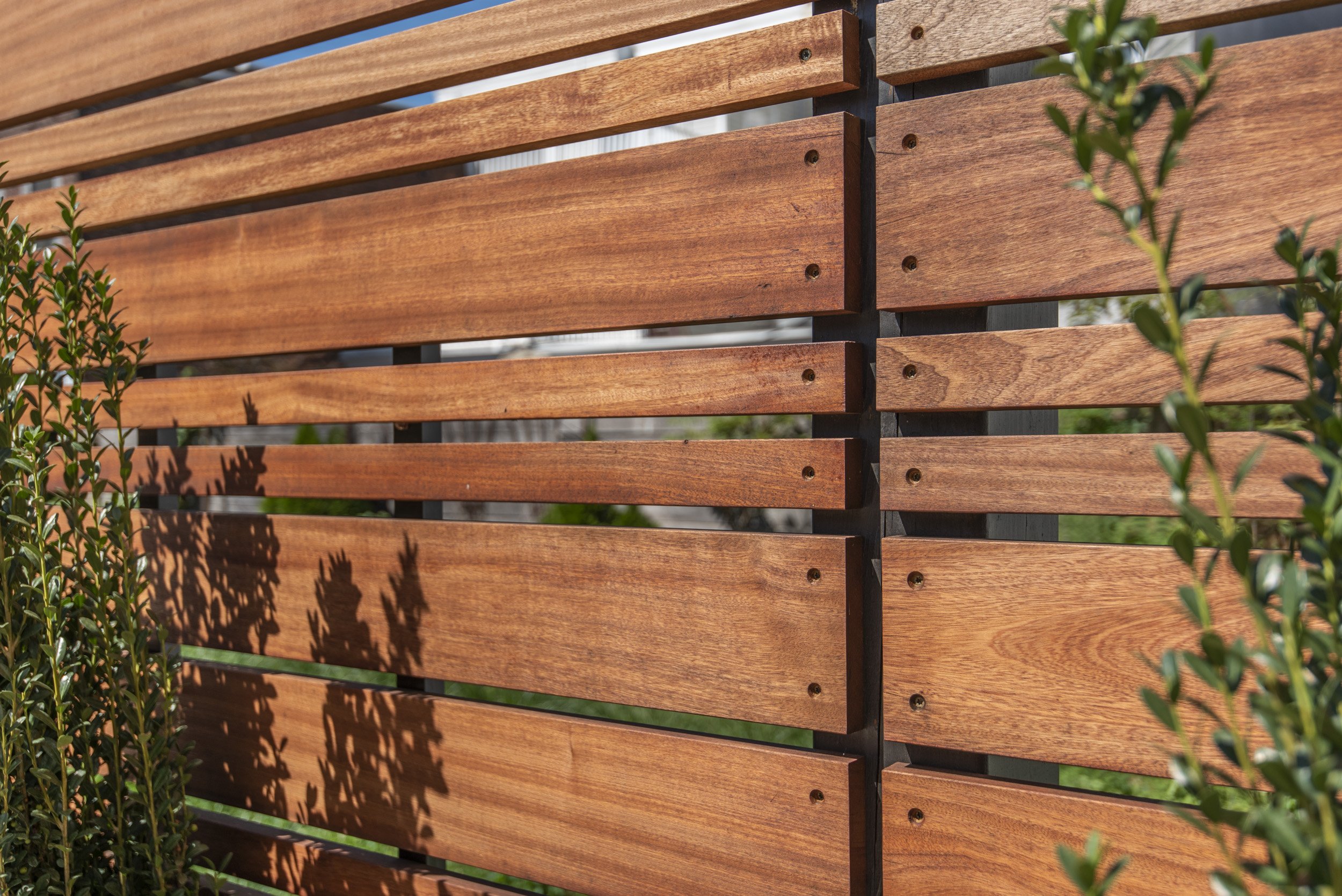  Fence design to amplify contrast in color and exhibit precision craftsmanship. 