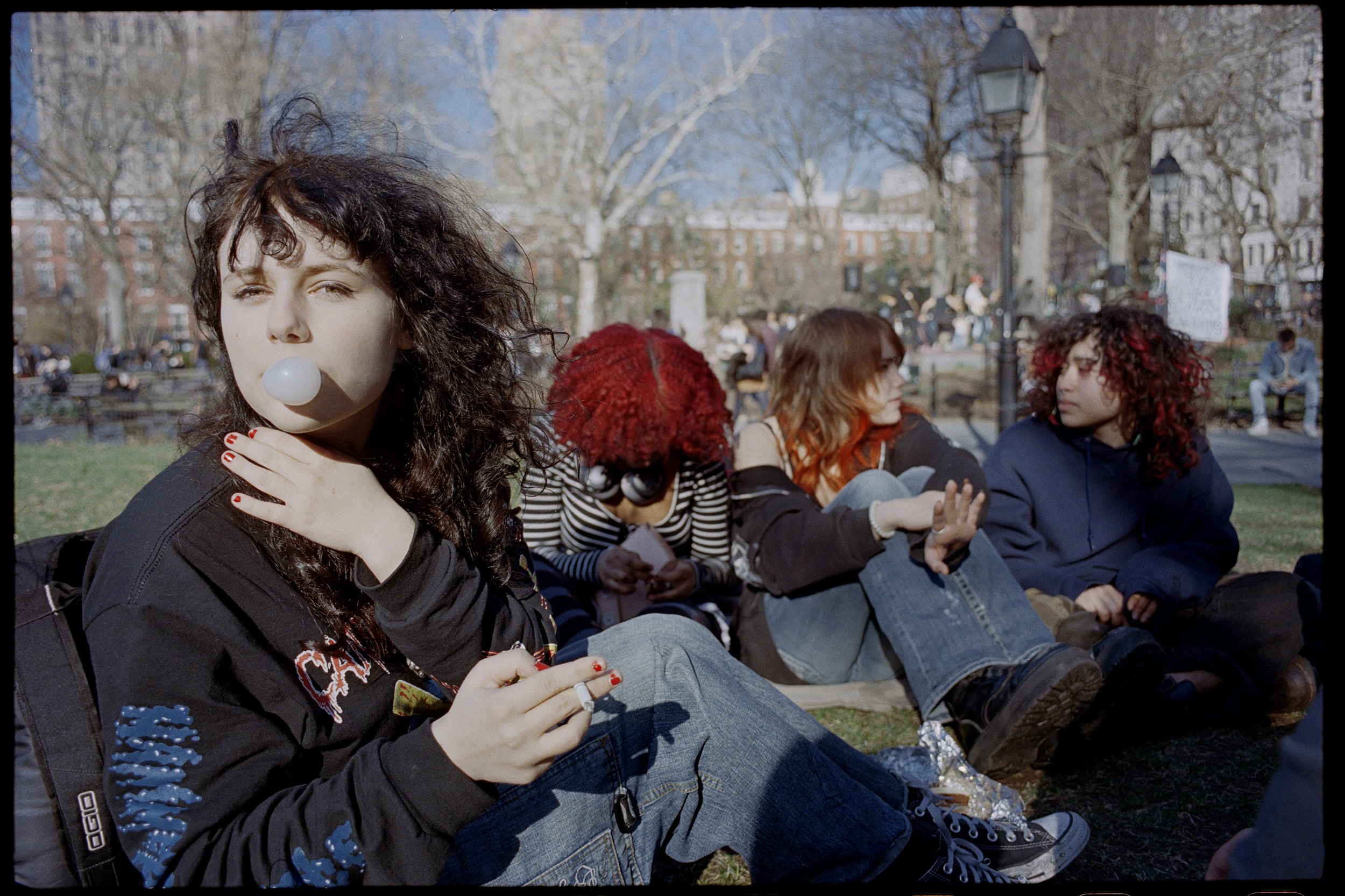 Mary with gum and smoke in grass 001.jpg