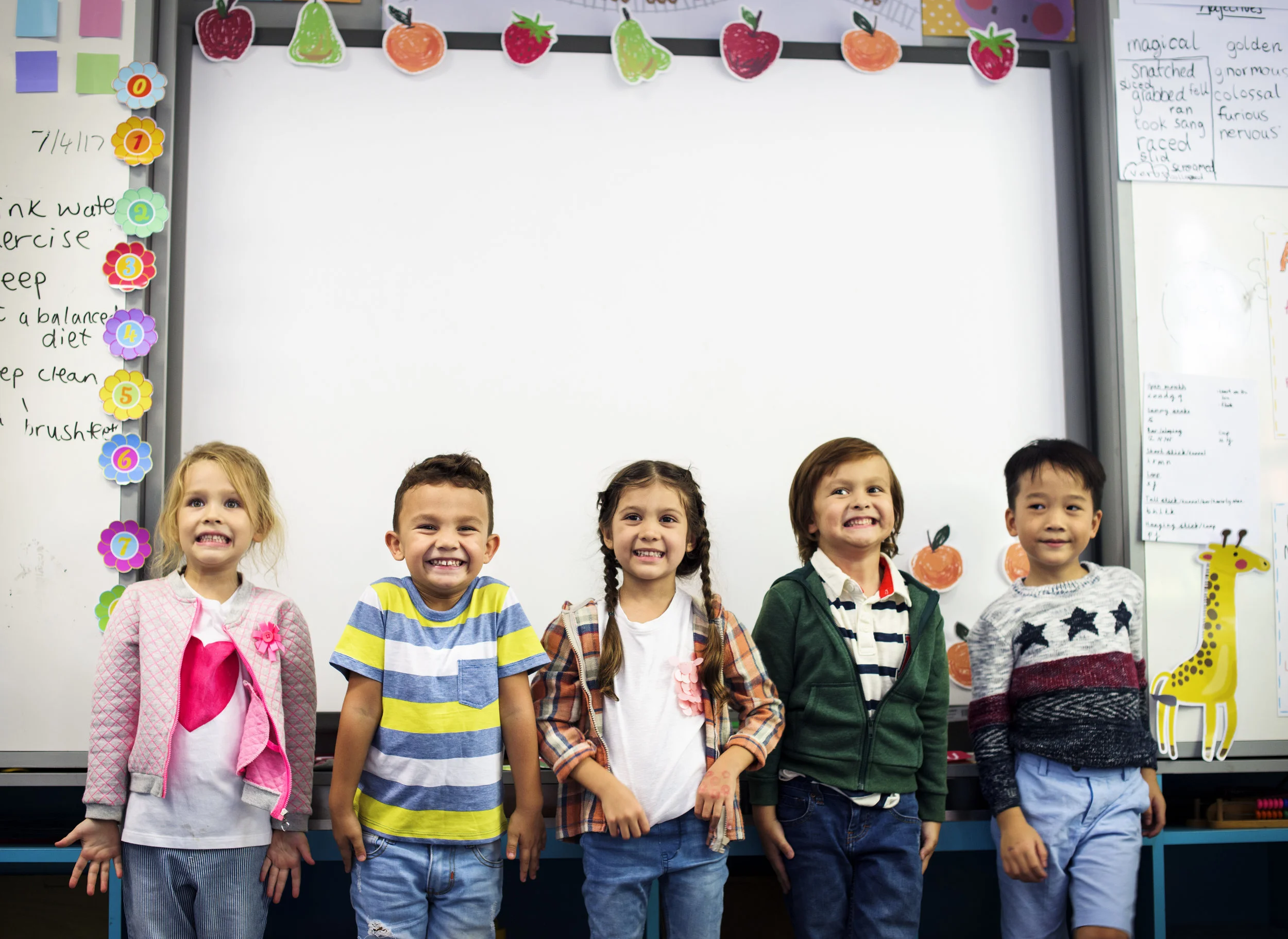 group-of-diverse-kindergarten-students-standing-PJ8KR2U.jpg