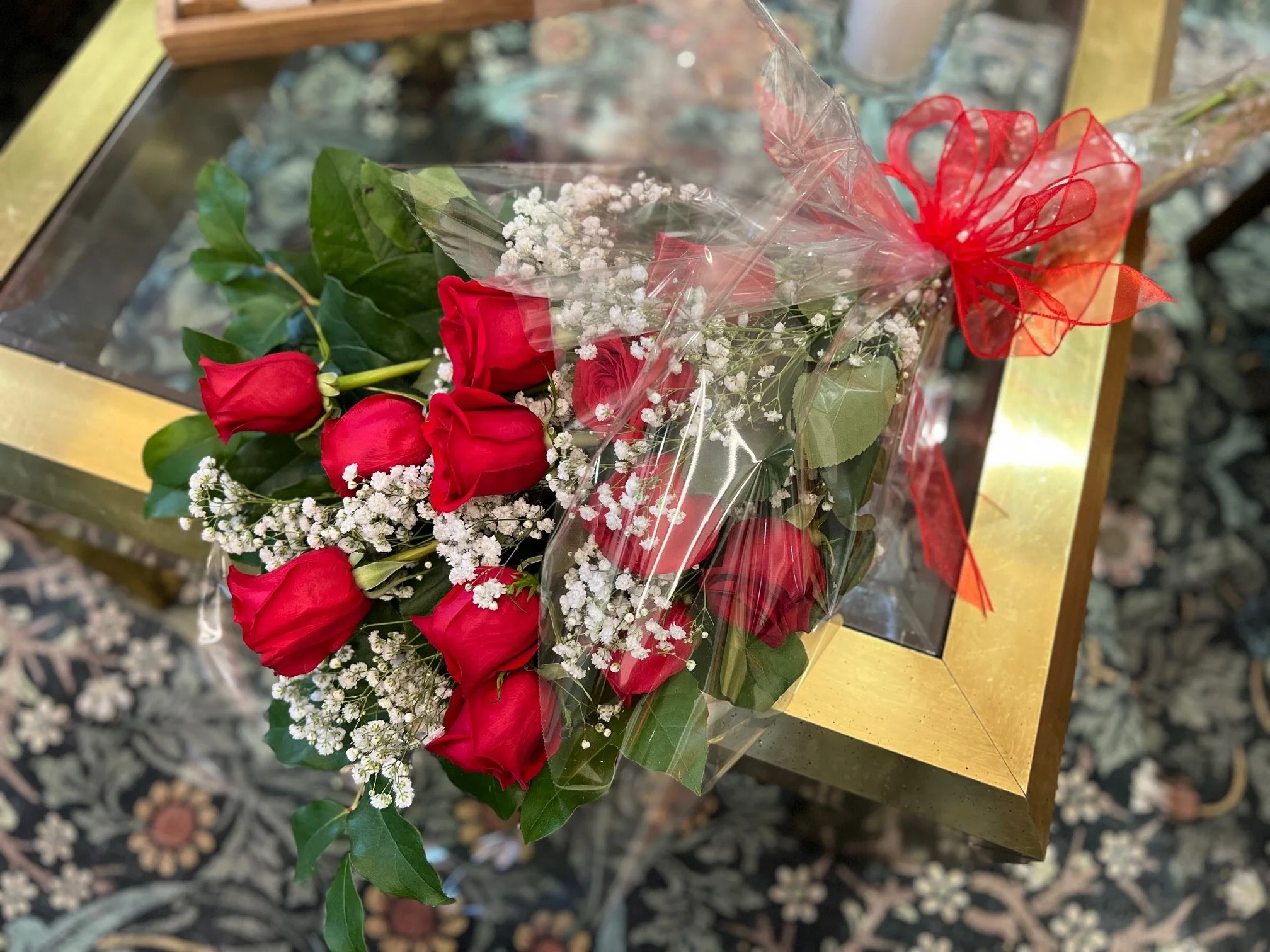 Dozen Red Roses Wrapped in Cellophane with a Bow