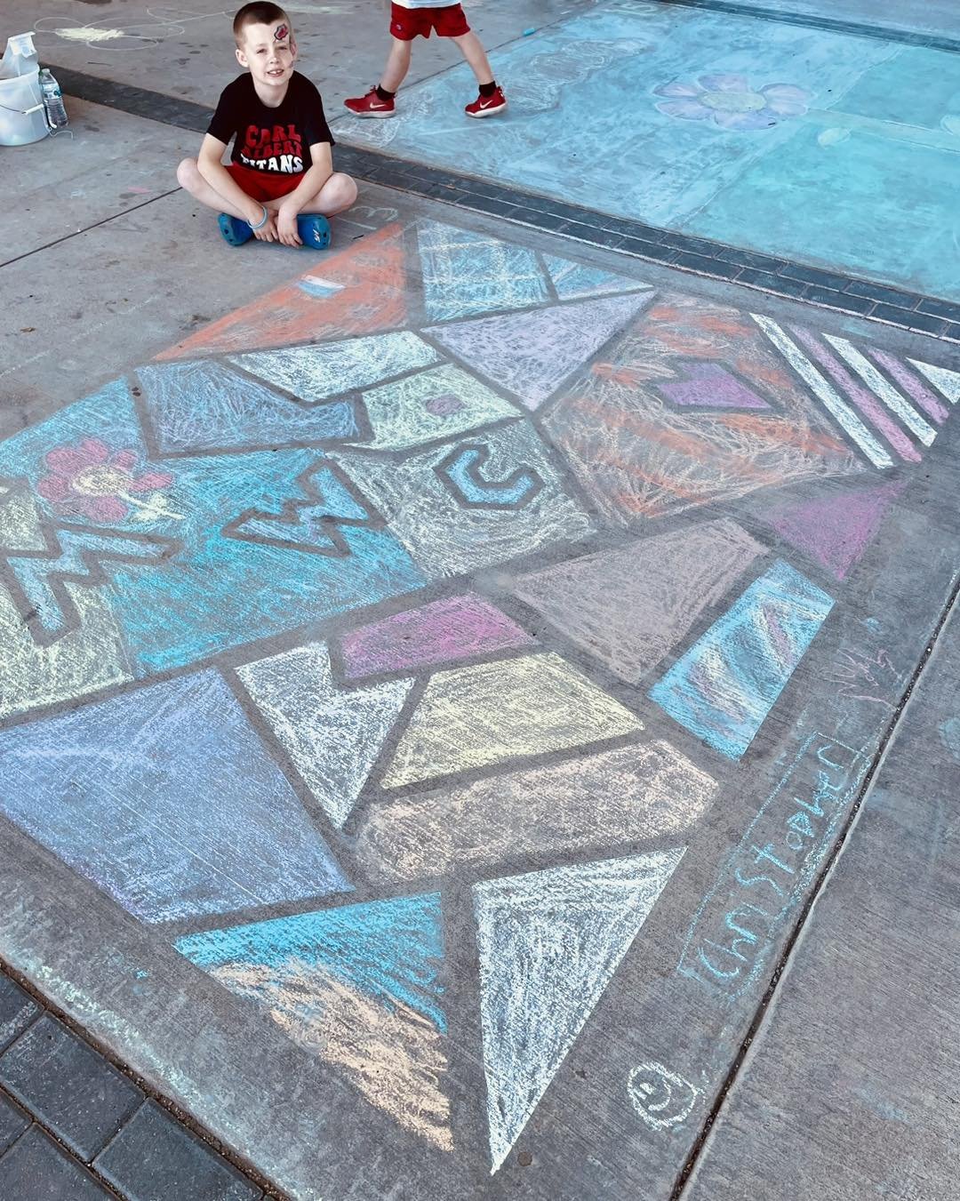 JSL volunteered at the Covered in Color event in Midwest City's new SkyTrain Hangar at W.P. Bill Atkinson Park in Town Center Plaza this weekend. The event featured local artists showcasing their talents in a sidewalk chalk competition. 

Excitingly,