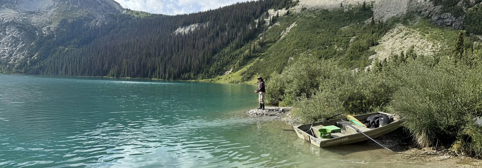 fishing_turquoise_alpine_lake.jpg