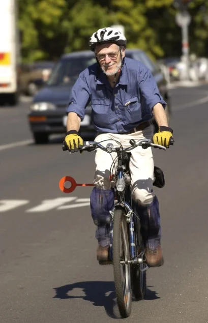 Frank Fisher getting around the streets of Melbourne by the most efficient means possible.