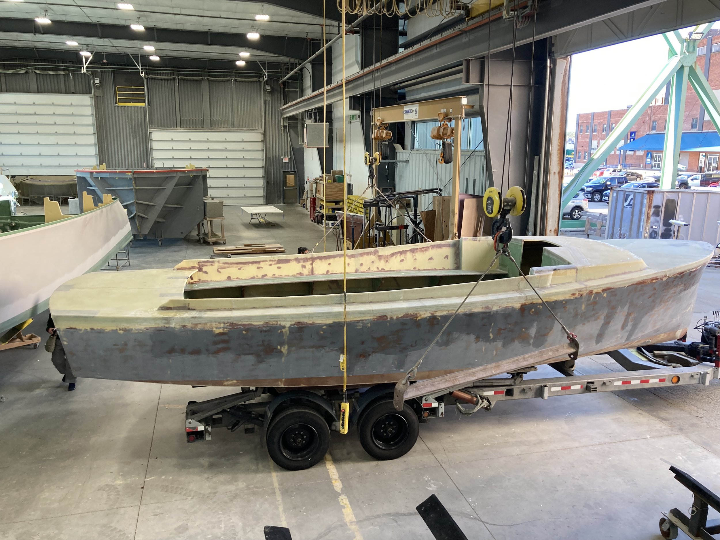    Appy VI hull being backed into the Boston Boatworks bay upon its arrival.   