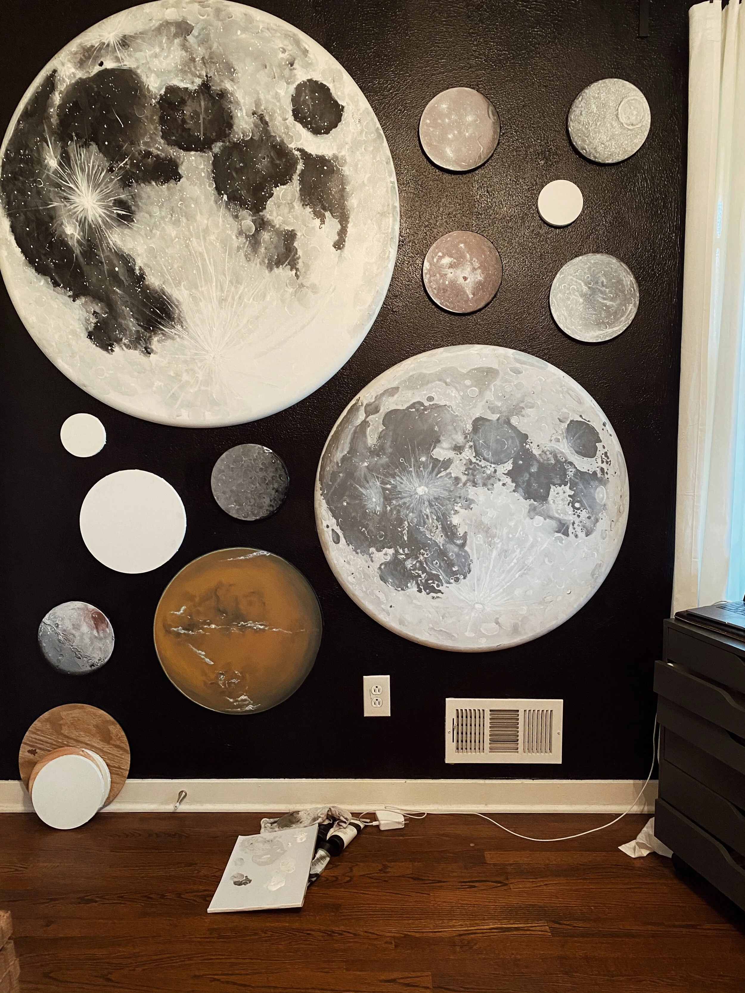 A conglomeration of finished and unfinished original Dust &amp; Ash Co. paintings in the home studio of owner Ash Wheeler.