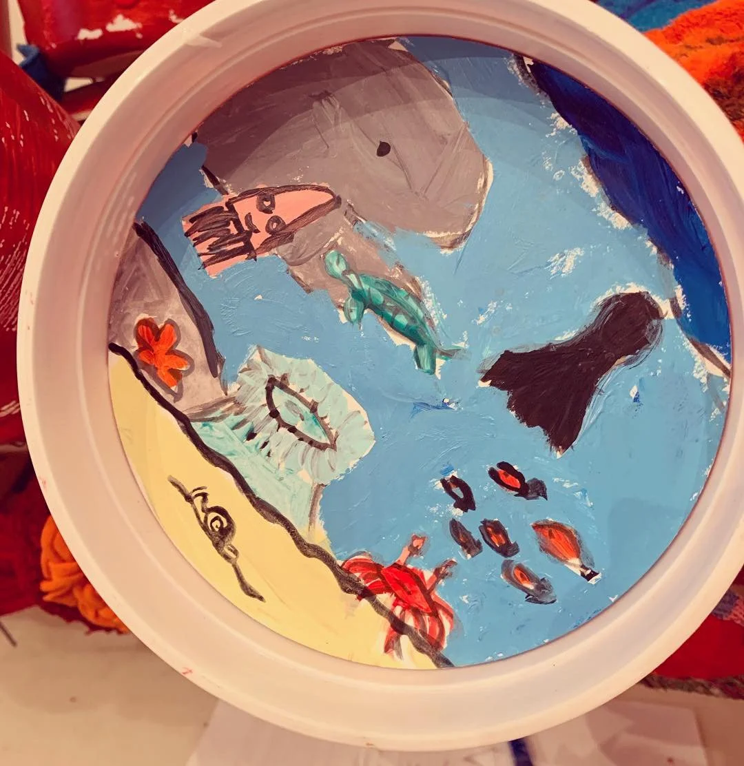  Tanna led youth of varying ages to create undersea themed art that was later mounted into the suckers of the Octopus sculpture.  