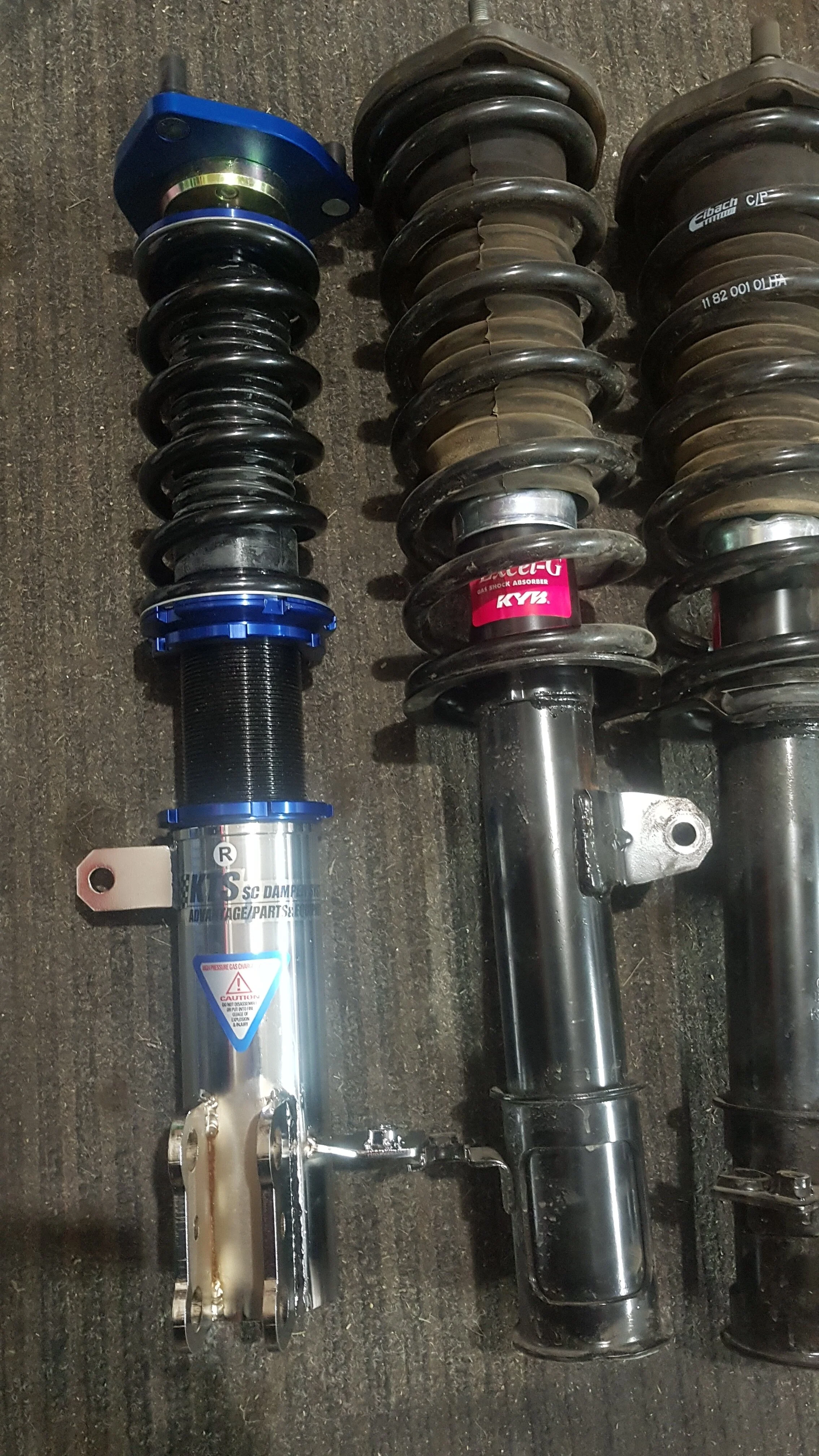 Comparison of the full coil over vs the “oem” setup. A little disappointed in the weight savings if there was any. But pretty psyched to see what an inverted monotube will feel like for this particular car. Overall quality is good but note that all inverted shocks have adjustments made at the bottom which kinda sucks making changes on the fly.