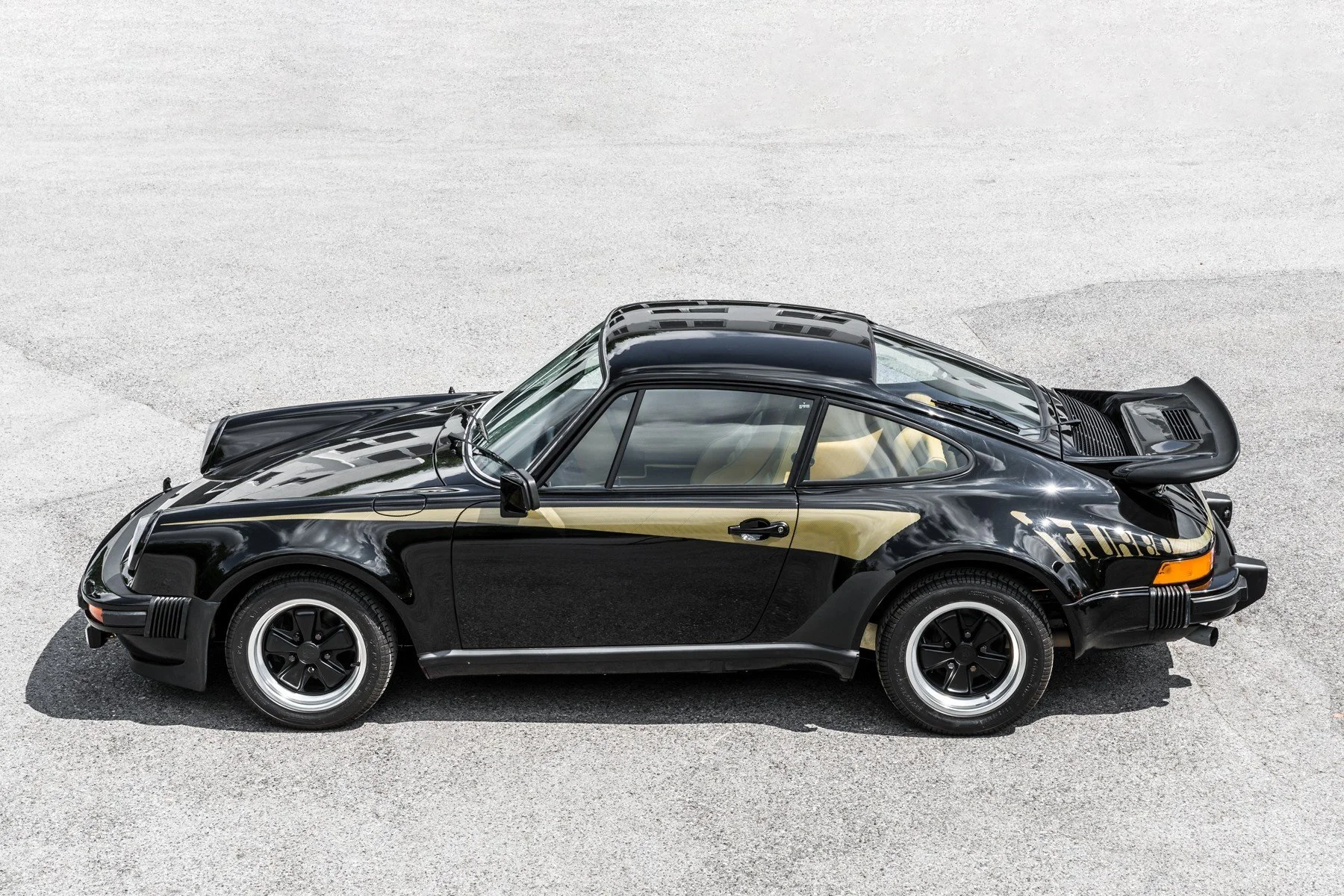 One to Buy: Non-sunroof Black on Yellow 1976 Porsche 911 3.0 Turbo (930)