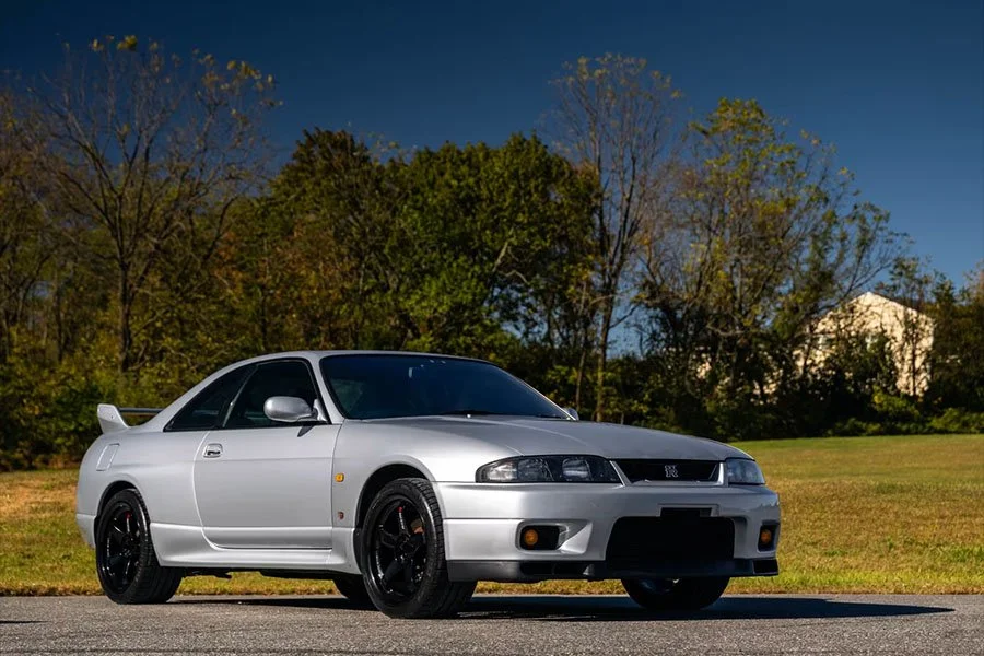 One to Buy: Silver 1995 Nissan R33 Skyline GT-R on Nismo LM GT4s