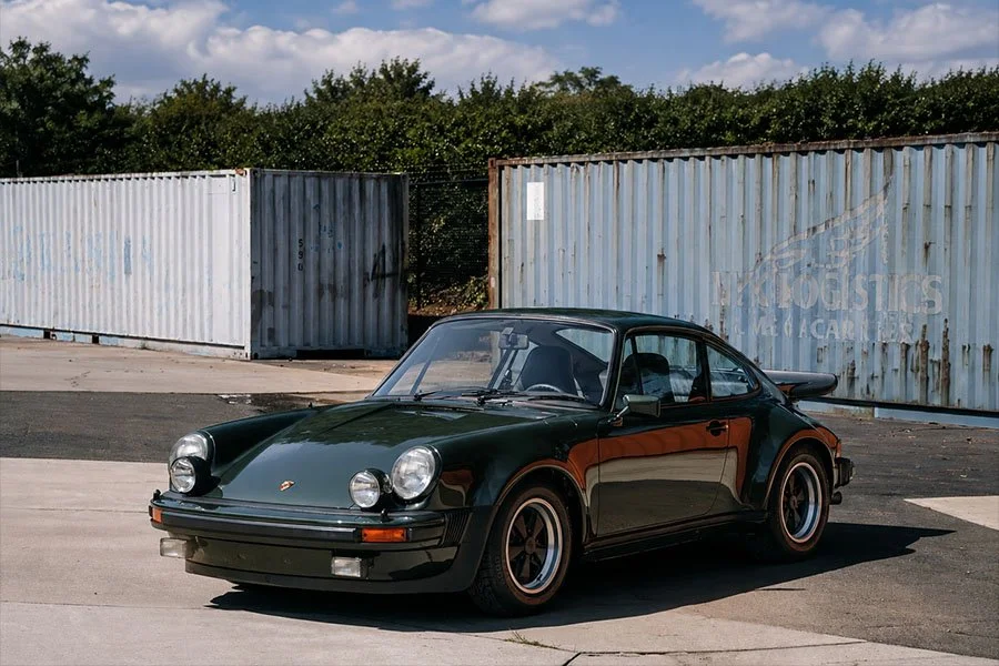 One to Buy: Oak Green Non Sunroof 1975 Porsche 911 3.0 Turbo (930) with Dealer-Installed Cibies