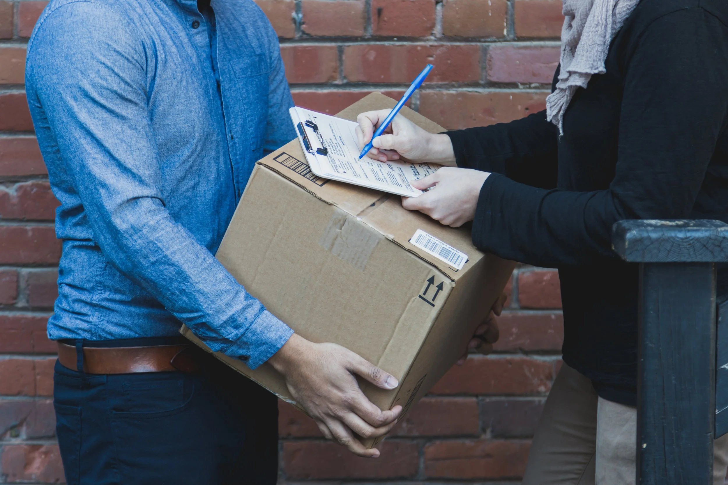 man-signing-for-shipping-box (1).jpg