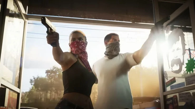 Alt text: In a scene from Grand Theft Auto 6, a man and a woman walk into a store wearing bandannas and holding guns.