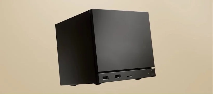Alt text: The square black Steam Machine.