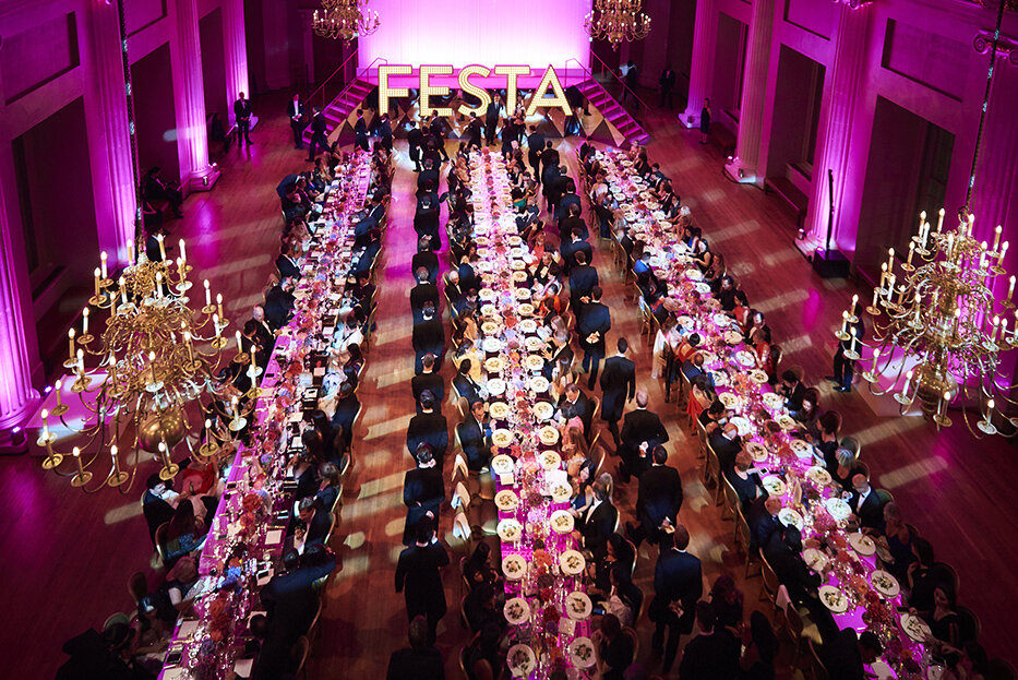  lavish dinner being served by waiters in banqueting house  