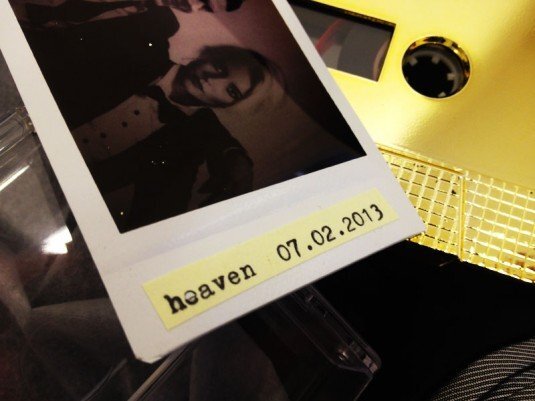  mystery woman in a polaroid picture includes the date for live music event 