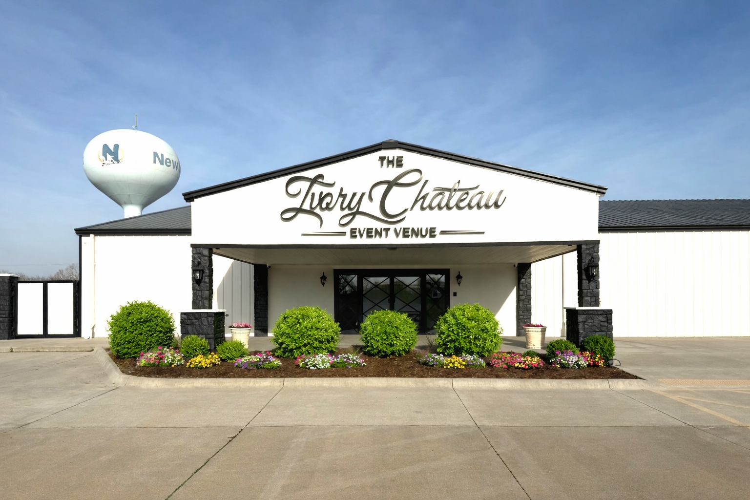 building front w bushes.png