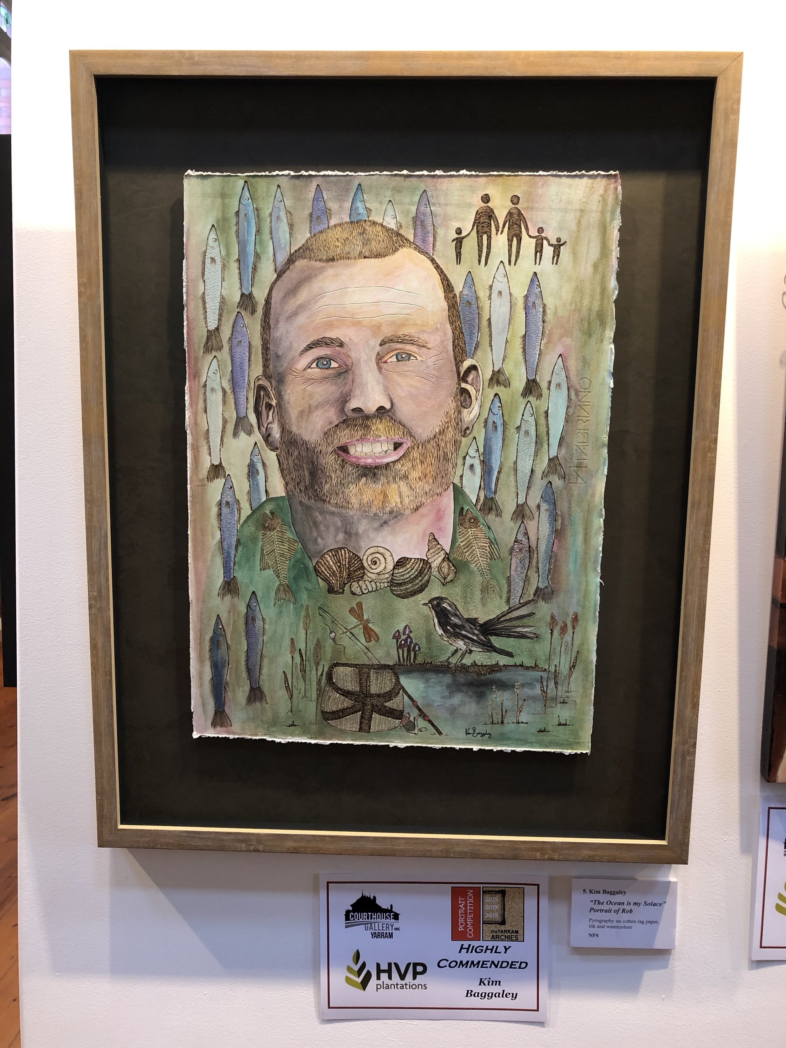  Highly Commended (Open)  Title: “The ocean is my solace - a portrait of Rob”  Pyrography Cotton Rag Paper, Ink and Watercolour 