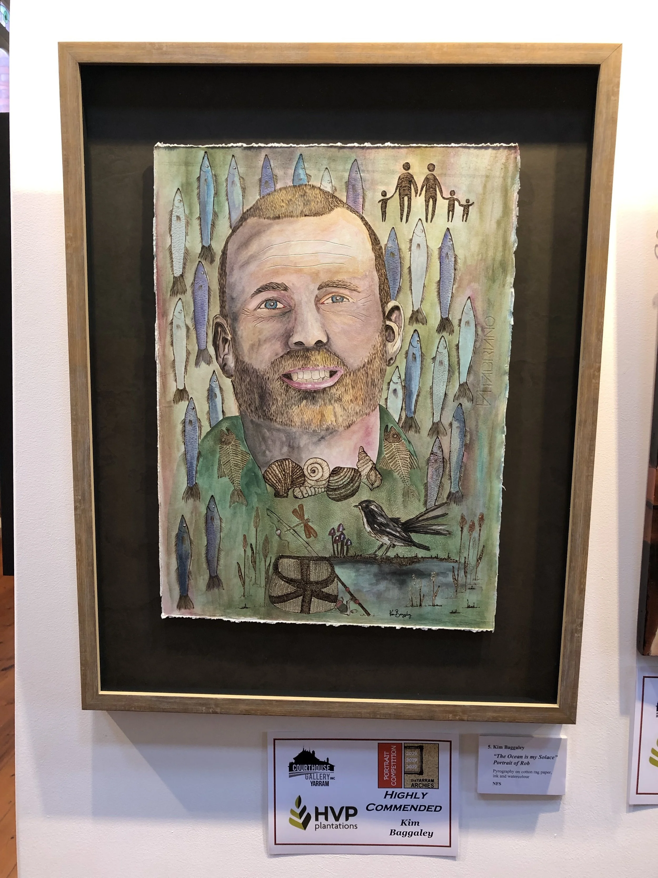 Highly Commended (Open) Title: “The ocean is my solace - a portrait of Rob” Pyrography Cotton Rag Paper, Ink and Watercolour
