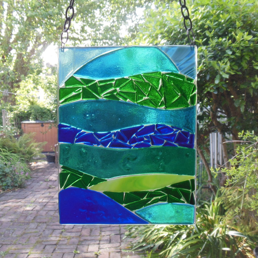 Blue-green fused glass seascape