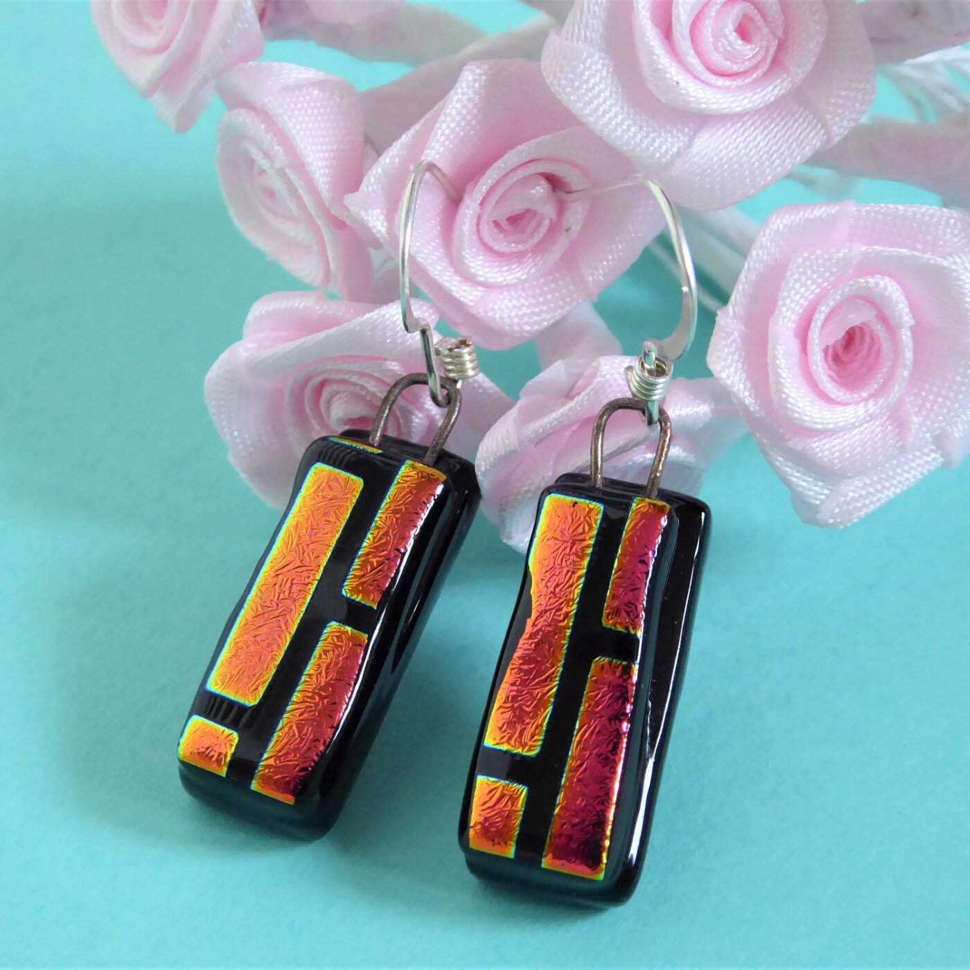 Pink and black striped dichroic glass earrings